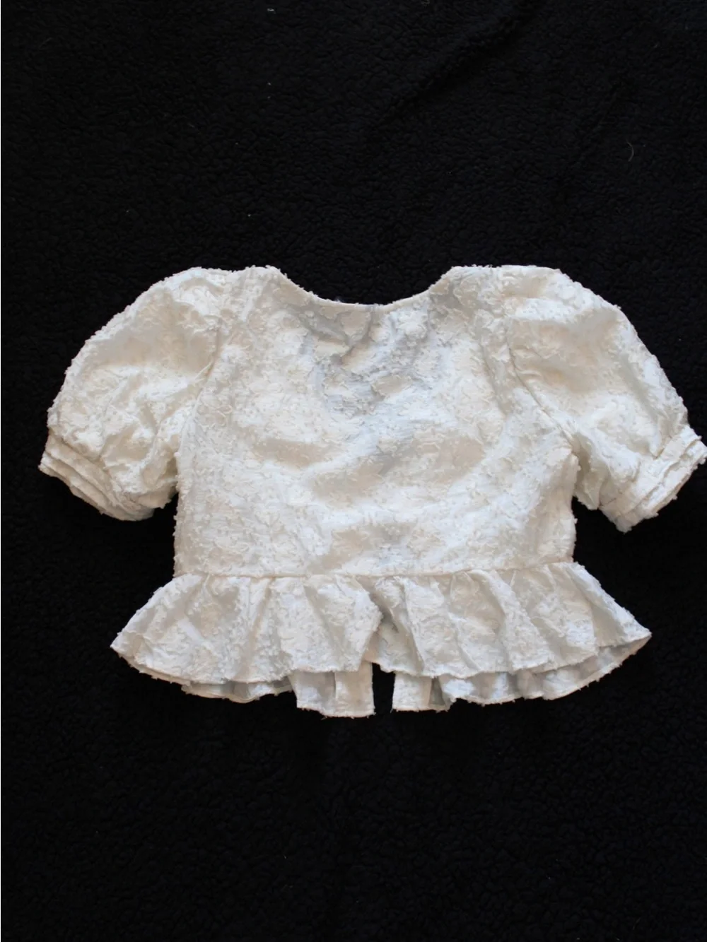Textured Ivory Puff-Sleeve Peplum Button-Front Top